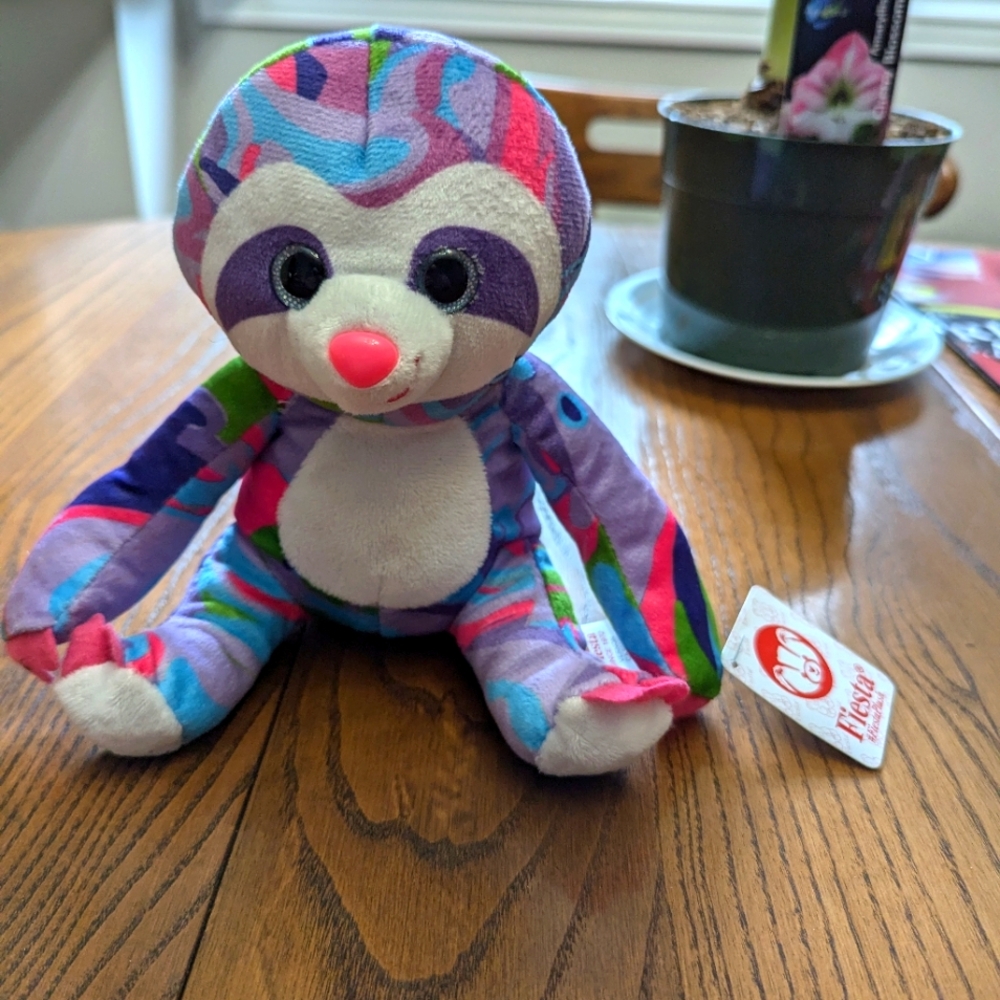Fiesta plush psychedelic 6.5 inch sloth. The Name is Vernon.